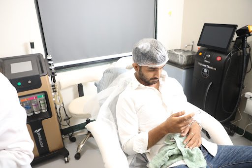 Male client preparing for aesthetic care at Yuga's Aesthetic Clinic